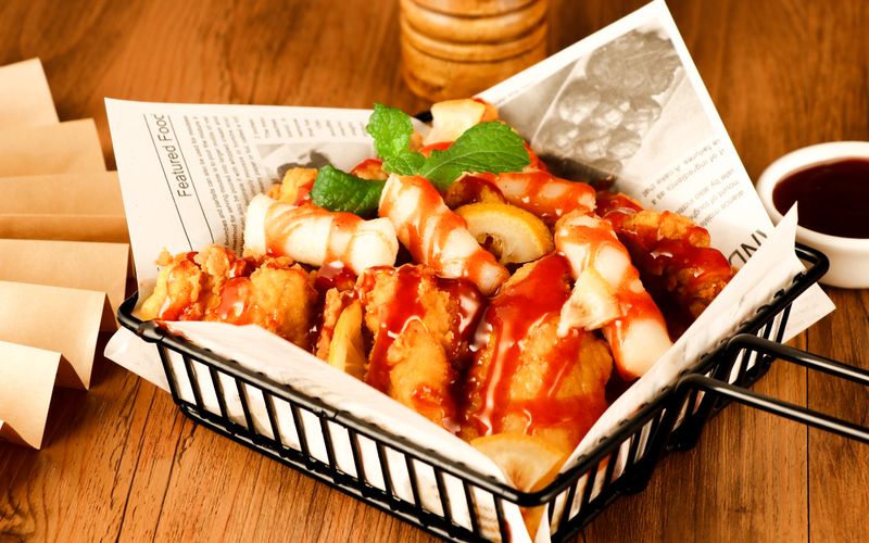 Hangry Joe's signature crispy chicken tenders with dipping sauce